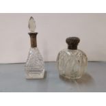 Two early 20th century silver mounted glass scent bottles Location: Porters