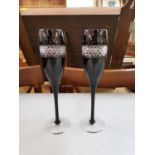 A pair of Waterford Crystal John Rocha champagne flutes Location: 6.1