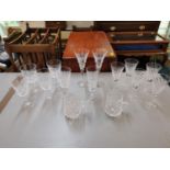 Waterford Crystal to include a pair of champagne flutes, two sets of five wine glasses, a single