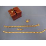 A 9ct gold rope twist bracelet A/F 4.95g, a gold ring tested as 14ct, and a yellow metal bracelet