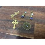 A 15ct gold cross pendant 1.1g, a 9ct gold necklace, 0.9g, a 9ct gold pendant fashioned as a