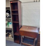 A 1930s oak drop leaf table and a stained pine bookcases. Location:RWB