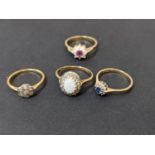 Two 9ct gold 4.2g, and one 18ct gold ring 1.85g, set with stones, and a yellow metal ring