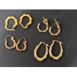 Four pairs of 9ct gold hoop earrings. Location:Cab