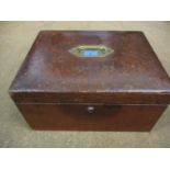 A Victorian leather bound jewellery/writing box with green plush velvet and leather interior and