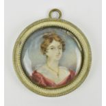 British School, late Georgian portrait miniature of a young lady on ivory, depicted wearing a red