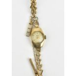 A 9ct gold Audax ladies wristwatch on a 9ct gold bracelet with clasp, 13g