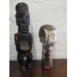 Two African Fetish carved wooden figures to include a Gabon Fang, peoples Janus figure and