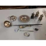 Silver to include a dish, mustard pot, three cruets, spoon, small ladle, 307g. A silver pin