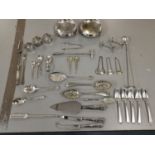 Silver plate to include a pair of dishes on claw feet, a pair of knife nests, a marrow scoop,