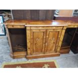 A Victorian breakfront sideboard with inlaid floral ivory and marquetry decoration to central twin