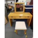 A contemporary light oak dressing table with matching stool Location: RAB