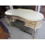 A painted kidney shaped dressing table on cabriole legs Location: A1