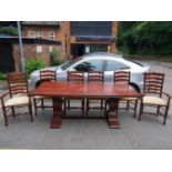 A good quality modern cherrywood dining table, 80 h x 214 w x 102 d, with six matching ladder back