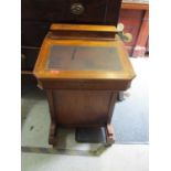 Victorian inlaid walnut Davenport, four side drawers and four blind drawers on castors