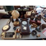 Mixed lot to include a Replogle globe, a clock, a barometer, wooden car, two composite models of