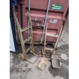 Two vintage wooden and iron sack barrows and two wooden trugs