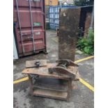 A vintage homemade wooden bench with a vice 24cm h x 42cm, two spare vices and a trolley - (Bench