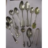 Silver spoons, sugar tongs to include an Irish teaspoon 99g and an 800 grade silver spoon, total