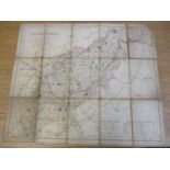 A small vintage map, paper on cloth, of Northamptonshire by J&C Walker published by Longman