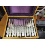 A Victorian cased set of Maple & Co fruit knives and forks with mother of pearl handles and engraved