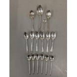 Silver to include two sets of six tea spoons, a pair of tea spoons and two others, 125g Location: