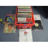 A crate of assorted Rock/Pop and Dance 12" singles to include Living in a Box, Paul Young, Skipworth