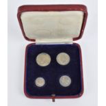 A cased set of George V Maundy money to include a 1932 4d, 1932 3d, 1932 2d and a 1932 1d