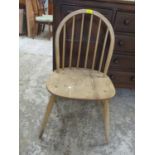 An Ercol Windsor kitchen chair, label to edge of seat A/F