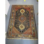 A Middle Eastern machine woven red ground rug