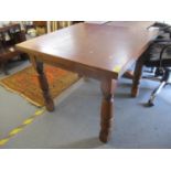 A mid 20th century oak extendable dining table. Location:SR