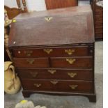 A George III stained oak bureau having two short and three long drawers Location: G