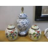 A pair of Japanese ginger jars and a later Chinese style table lamp