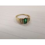 A 9ct gold ring set with emerald and diamonds, 2.4g Location: Cabs