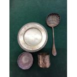Continental silver to include a circular tray, a dish, napkin ring and a tea strainer, 235g