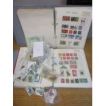 World postage stamps contained in two albums and loose examples