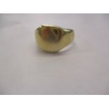 A 9ct gold signet ring dated 1929, tests as gold, ring size P, 7.6g Location: Cab