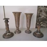 A pair of Old Sheffield plated candlesticks with engraved family rest, and two military issue silver