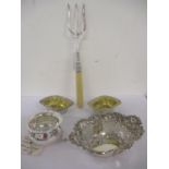 Early 20th century silver items to include a pierced dish, a salt, a silver collared pickle fork and