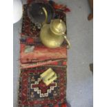 A Middle Eastern lot to include a woven saddle bag together with a carved stone and an Oriental