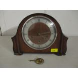 A Smiths early to mid 20th century walnut cased mantel clock with Westminster chimes, the movement