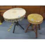 A late Victorian beech music stool with an upholstered seat, and an ebonized gypsy table Location:
