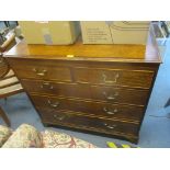 A George III oak and mahogany straight fronted chest of two short and three long with Georgian