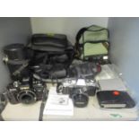 Photographic equipment to include a Minolta X300, a X700, a Tamron lens and other items Location: