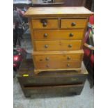 A late 20th century miniature pine chest on chest with drawers, and a contemporary mahogany finished