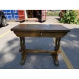 A late 19th/early 20th century oak trestle side table with two drawers, 75 h x 92 w x 46cm d