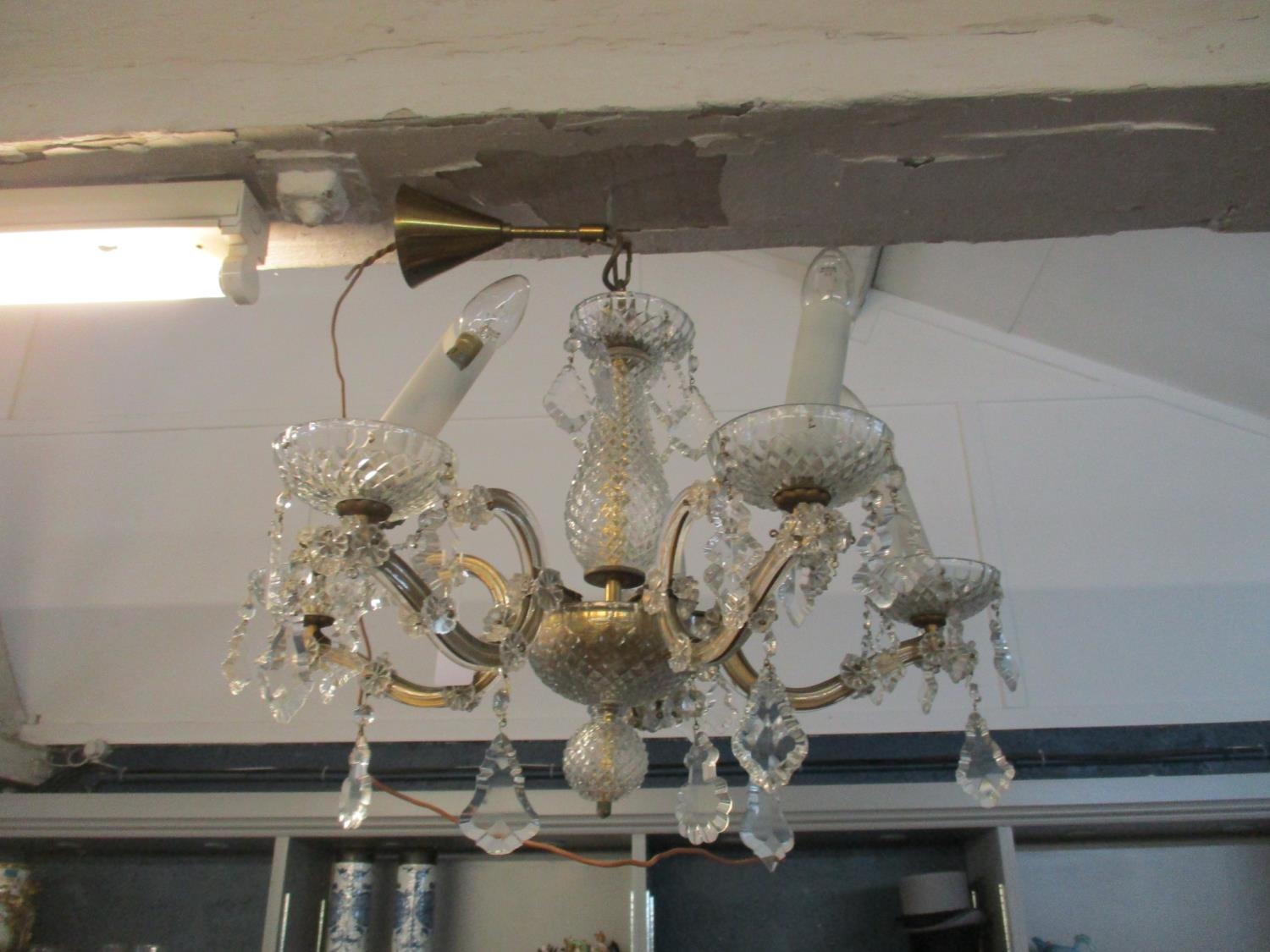 A brass and pressed glass five branch chandelier Location: SLCeiling