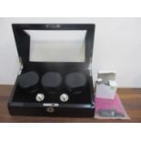 An electrical three watch winder case, never used