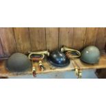 A group of 20th century British Army helmets to include a WWII era Home Defence black painted