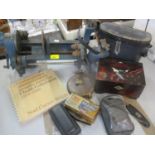 A vintage Homcan table top home canning machine in blue, and other vintage household items to